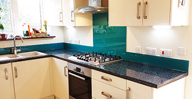 Turquoise splashback in kitchen